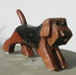 shaved scotty dog sidebar brown with a black body